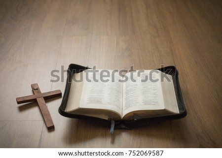 Close-up Holy Cross and Holy Bible, speech of God