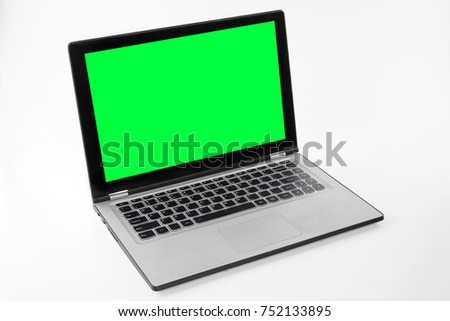 Laptop or notebook with a chroma key green display on a isolated background