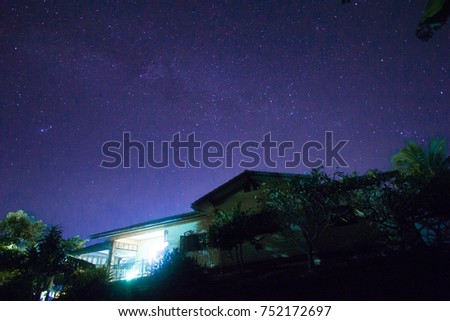 star in night sky above the house in the dark with grain  