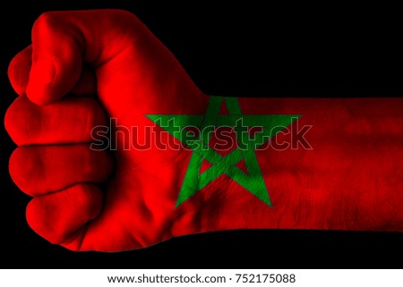 Fist painted in colors of Marocco flag, fist flag, country of Marocco