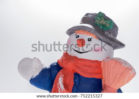 Snowman ceramic model isolated on white background