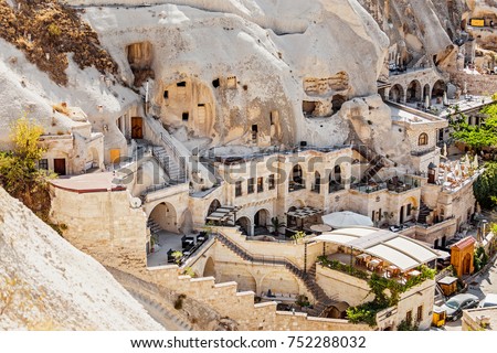 Cappadocia hotels carved from stone rock, cave style Royalty-Free Stock Photo #752288032