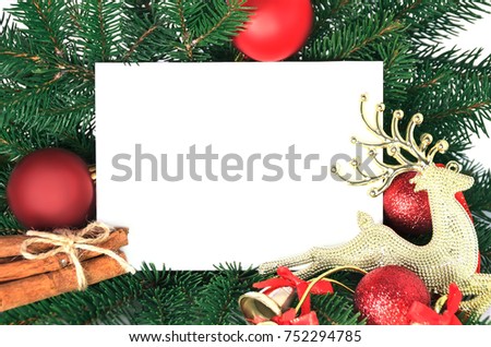 Christmas invitation card for holiday greeting decorated by fir brunches and ornaments. Blank have copy space for text