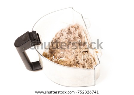 trash and dust into the cleaner container Royalty-Free Stock Photo #752326741
