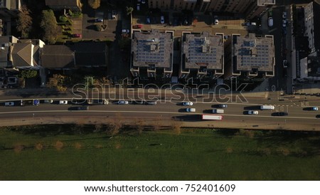 Top View Aerial Drone image of a rooftop covered with solar panels in London, England, UK.