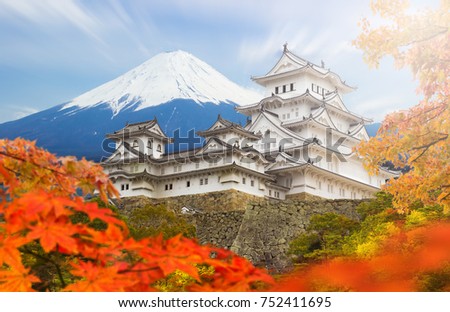 Himeji castle and maple autumn leaves with Fuji mountain background, One of Japan's premier historic castles, Japan