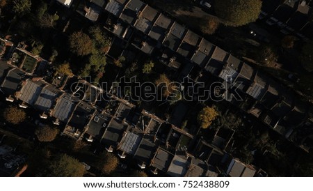 Top View Aerial Drone image of suburbs in North London, England on a bright sunny day.