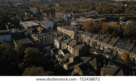 Top View Aerial Drone image of suburbs in North London, England on a bright sunny day.