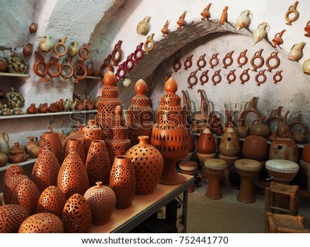 Handcrafted clay lamps and traditional turkish musical instrument udu in an clay atelier in Avanos, Turkey  Royalty-Free Stock Photo #752441770