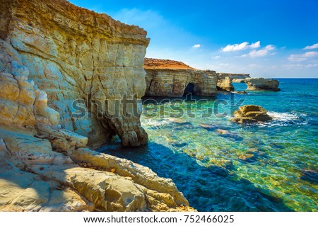 Sea caves on Coral bay coastline, Cyprus, Peyia, Paphos district Royalty-Free Stock Photo #752466025