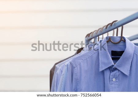 Housework of dry cleaning clothes man shirt