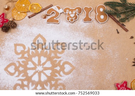 Christmas decorations top view on brown background