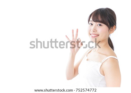 beauty woman giving someone ok sign
