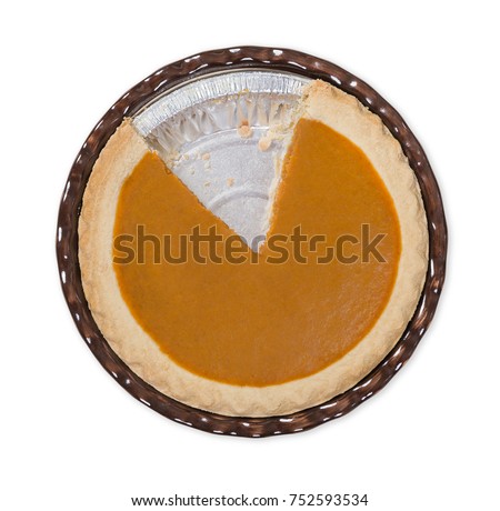 Pumpkin pie with a slice cut out, isolated on white background. Top view. 