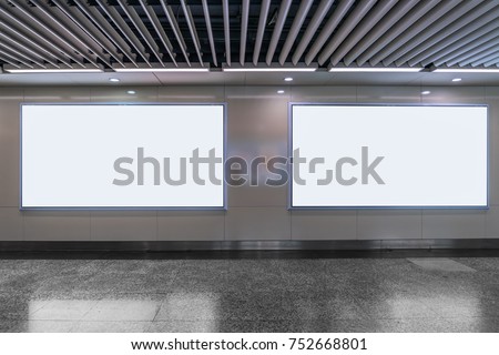 big horizontal poster on metro station
