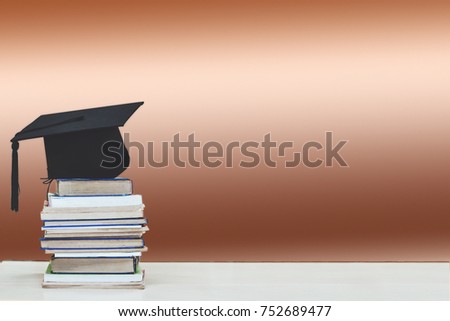 Graduation Cap and Books in Library room,Education concept