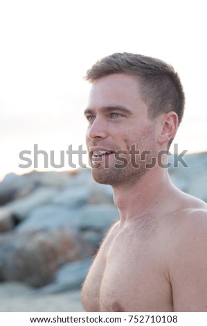 Handsome Male Smiling Portrait on Beach