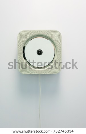Wall mounted CD player isolated on white background