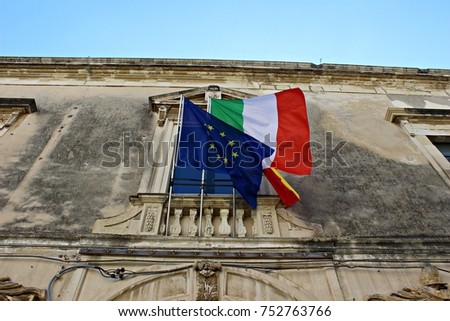 Italy, Sicily: Old house with flags Italy Europe and Sicily