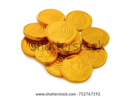 Image of jewish holiday Hanukkah with gold chocolate coins isolated on white.