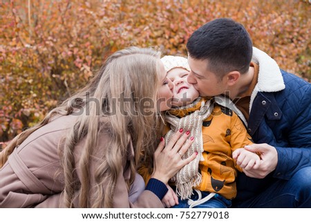 family to boys walk on autumn Woods 1