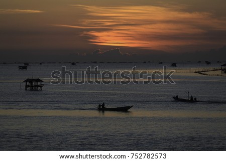 the landscape photo of fishing village in sunrise, the famous place for travel in Thailand
