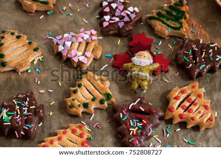 colorful christmas biscuits with a Santa Claus
