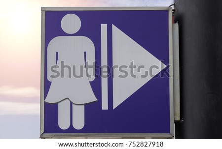 women toilet sign in morning at roadside