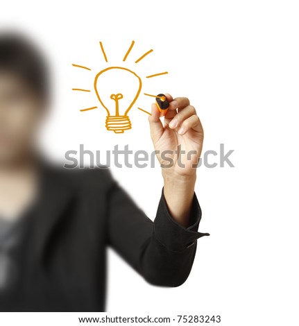 hand with a pen drawing light bulb Royalty-Free Stock Photo #75283243