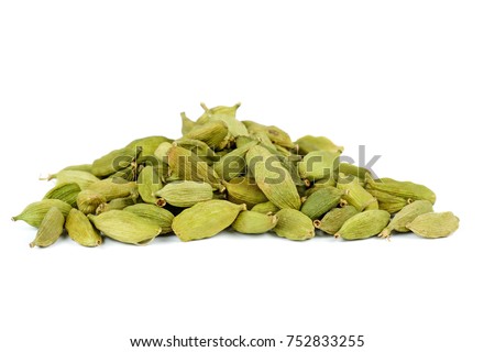 Small pile of green cardamon seeds isolated on the white background Royalty-Free Stock Photo #752833255