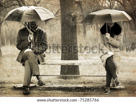 Two sitting at bench in rainy day. Photo in old image style.