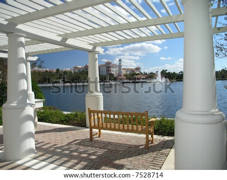 Vacation Resort Building Lake and White Trellis
