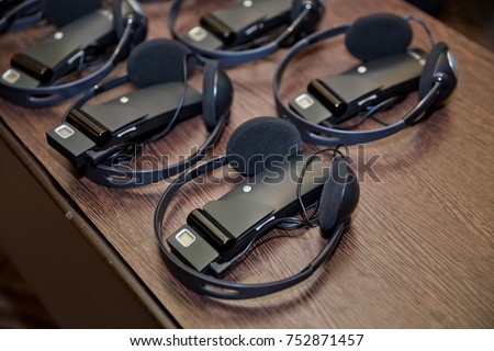headphones used for simultaneous translation equipment simultaneous interpretation equipment  Royalty-Free Stock Photo #752871457