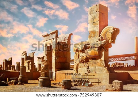 Stone sculpture of a horse in Persepolis against a blue and pink sky with clouds. Sunrise. The Victory symbol of the ancient Achaemenid Kingdom. Iran. Persia. Shiraz. Royalty-Free Stock Photo #752949307