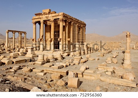 Ruins of the temple of Baal-Shamin in the ancient Semitic city of Palmyra on syrian desert (shortly before the war) Royalty-Free Stock Photo #752956360
