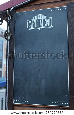 Vintage empty chalkboard menu close up outside