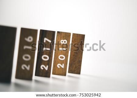 wooden block and number 2018. business concept