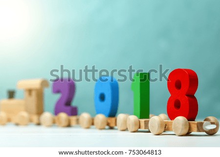 2018 happy new year,wooden toy train carrying numbers
