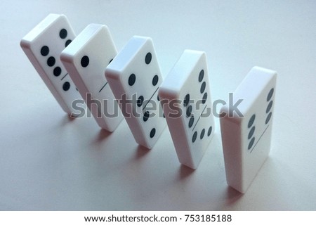 Domino line on the white background