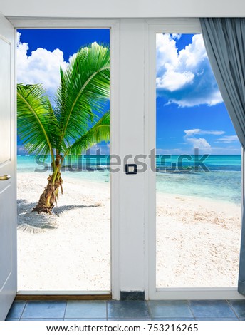 open door with access to the beach view of palms the Caribbean sea Dominican Republic