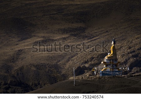 Buddha Statue in the Himalaya Mountains of India