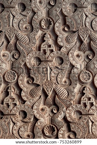 Islamic symbols, calligraphy and sacred geometry carved in wood in Marrakesh, Morocco.