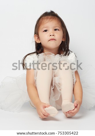 Asian little girl ballerina happy with ballet