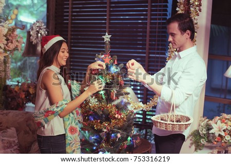couples in meeting holiday party.
happy new year and merry Christmas concept.