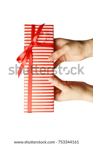 gift in hand isolated on white background, gift box for holiday, red gift box