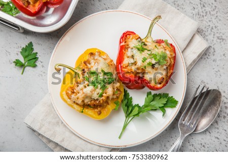 bell peppers stufed with meat,  vegetables and cheese, top view Royalty-Free Stock Photo #753380962
