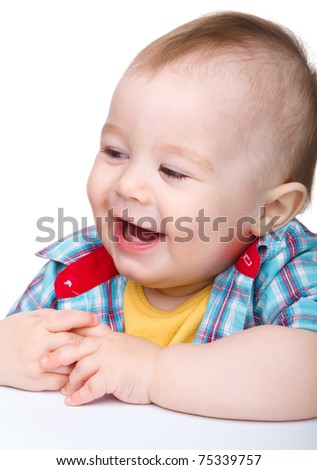 Portrait of a cute little boy, isolated over white