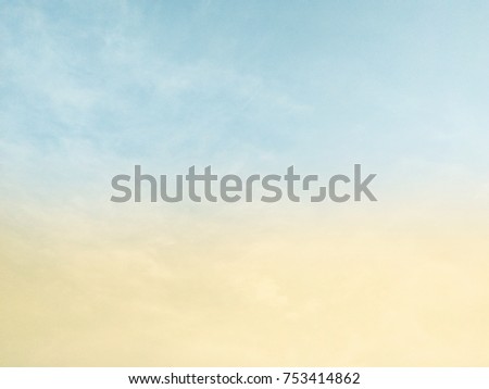 Two colorful morning sky on cloud background.Blue and yellow of the sun  