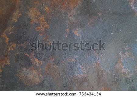 Corrosion of metal, with scratches and cracks. The vintag colored grunge iron textured background