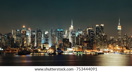 Midtown Manhattan skyline at dusk panorama over Hudson River